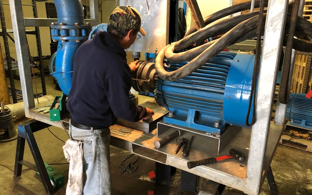 ABET Pump Mechanic working on a PACO Pump skid at our shop in Pasadena, Texas.